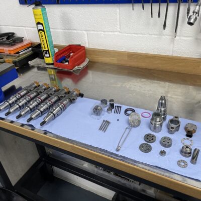 Heui parts laid out ready for assembly.